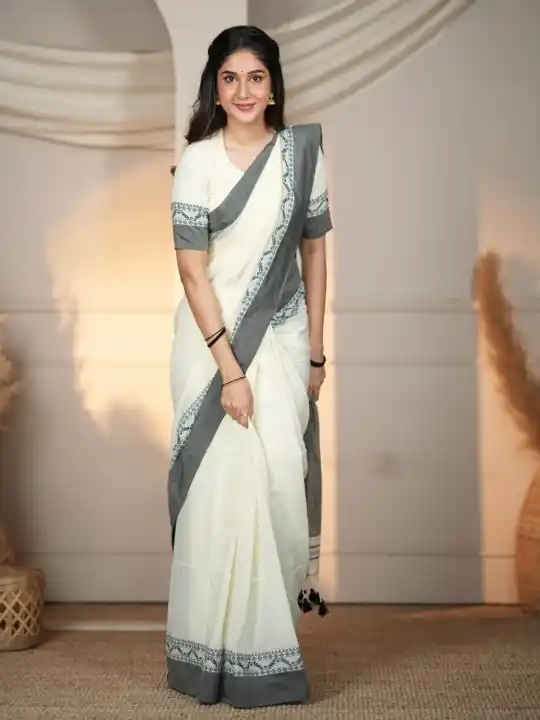 The Weaver's Touch: Pure Bengal Cotton Saree with Timeless Appeal.png