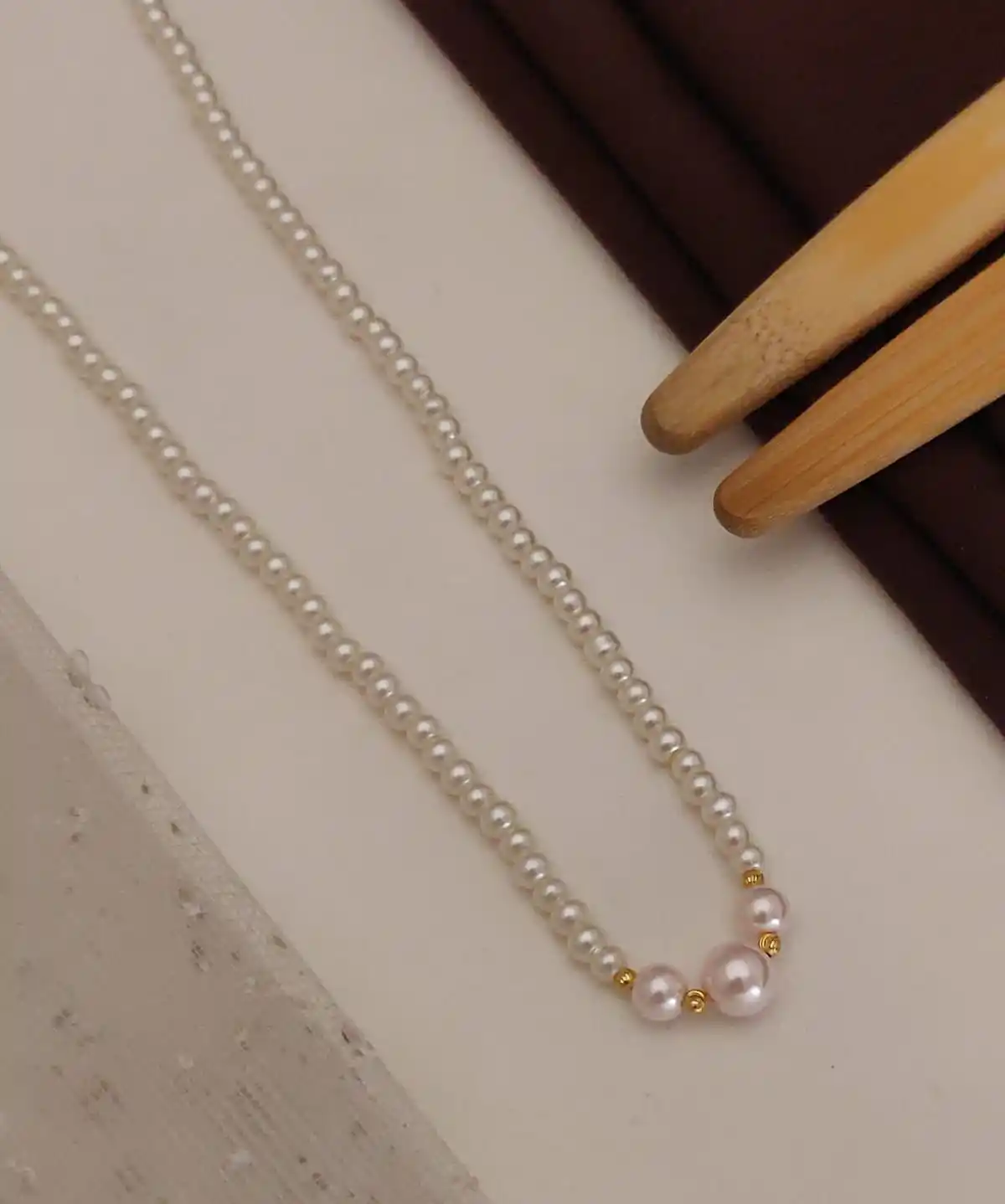 Trendy designer pink pearl chain.png