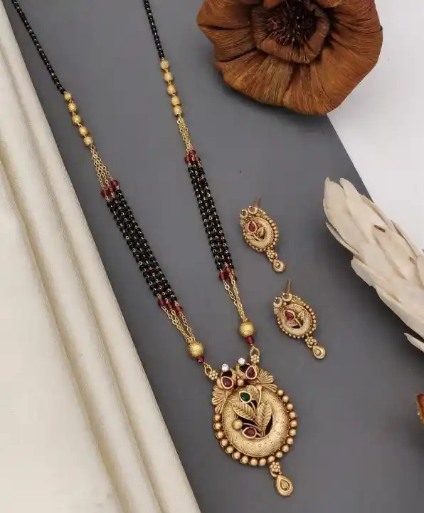 Designer high gold plated ad diaond studded fancy mangalsutra with earring.png
