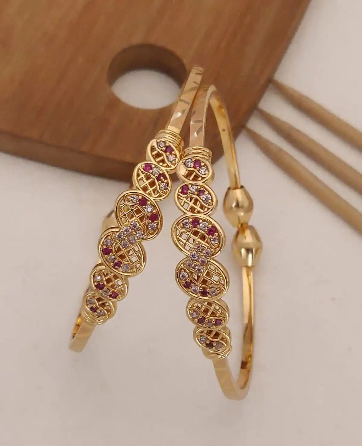 new designer premium quality high gold plated ad diamond ruby stone fancy adjustable kadli bangle for women.png