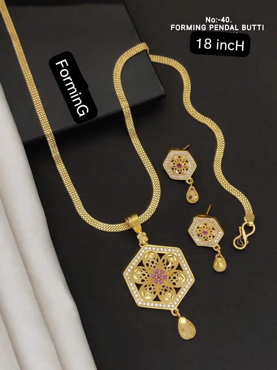 micro gold plated ad diamond studed fancy flower pendent set with 18 inches chain.png
