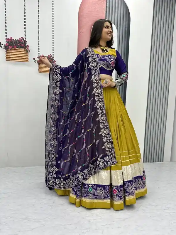 Yellow And Blue Heavy Lichi Fabric And Jacquard Silk Patola Print Lehenga Choli For Women.png