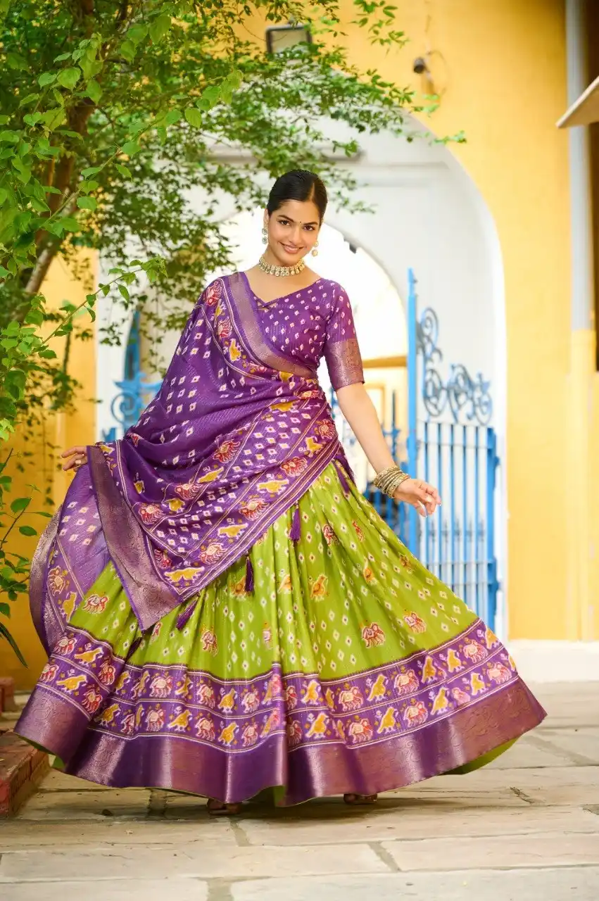 Mehndi And Purple Heavy Lichi Fabric And Jacquard Silk Patola Print Lehenga Choli For Women.png