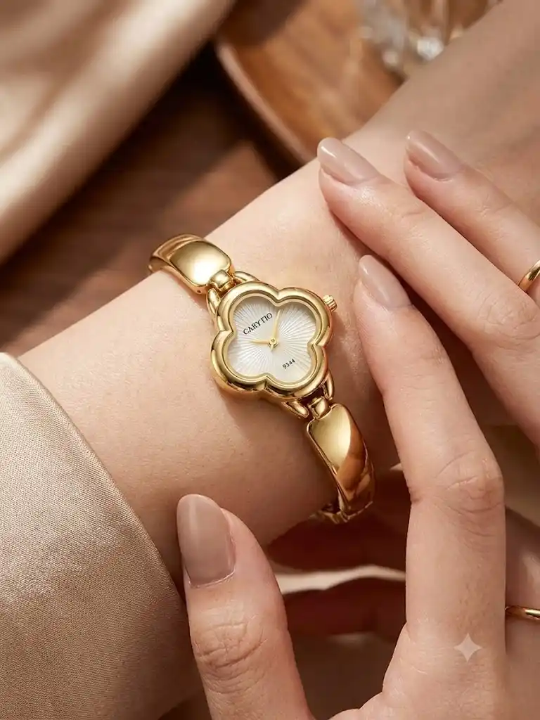 Elegant Gold-Tone Clover Dial Analog Watch for Women.png