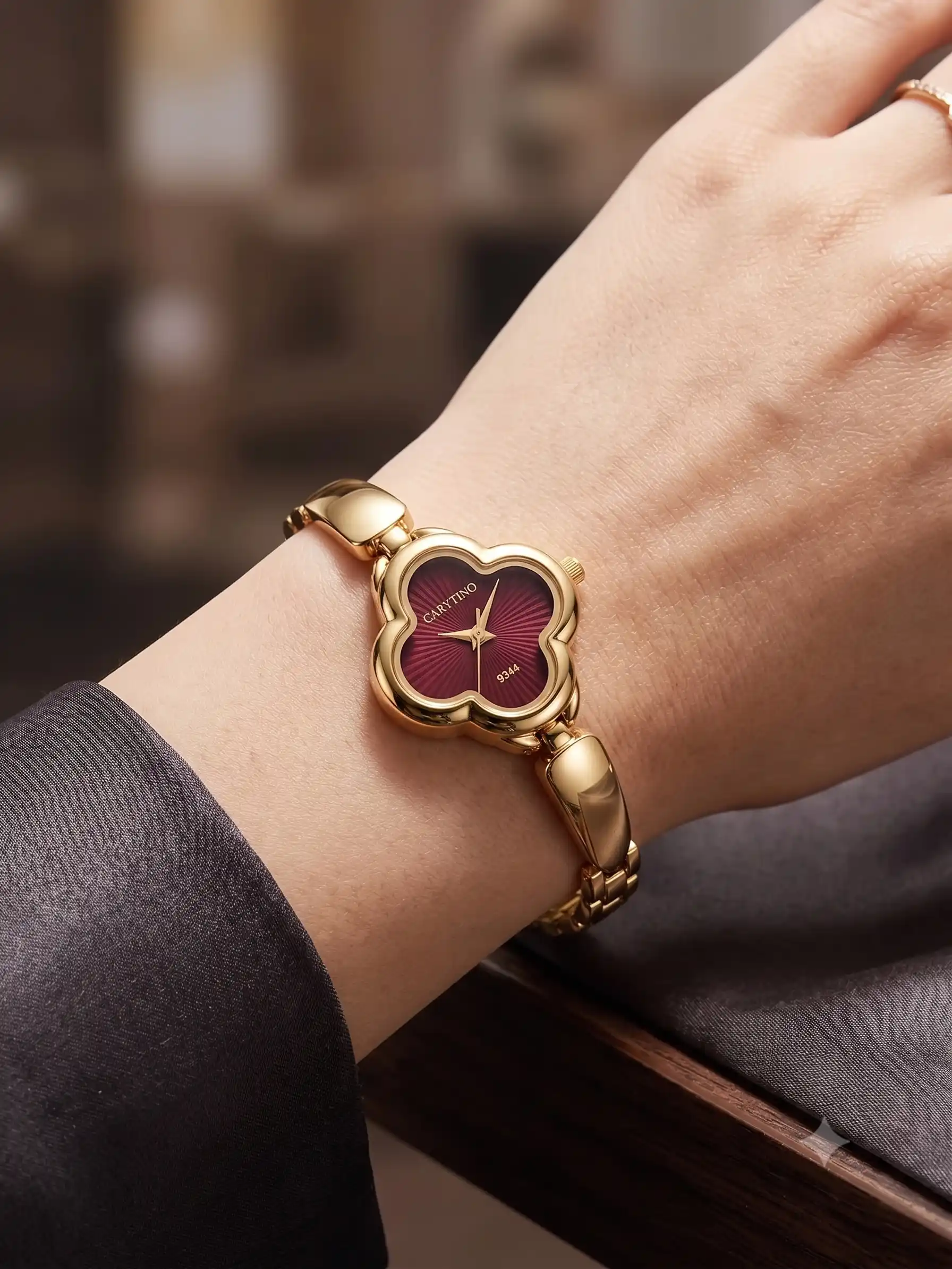 Elegant Gold-Tone Clover Dial Ladies Watch.png
