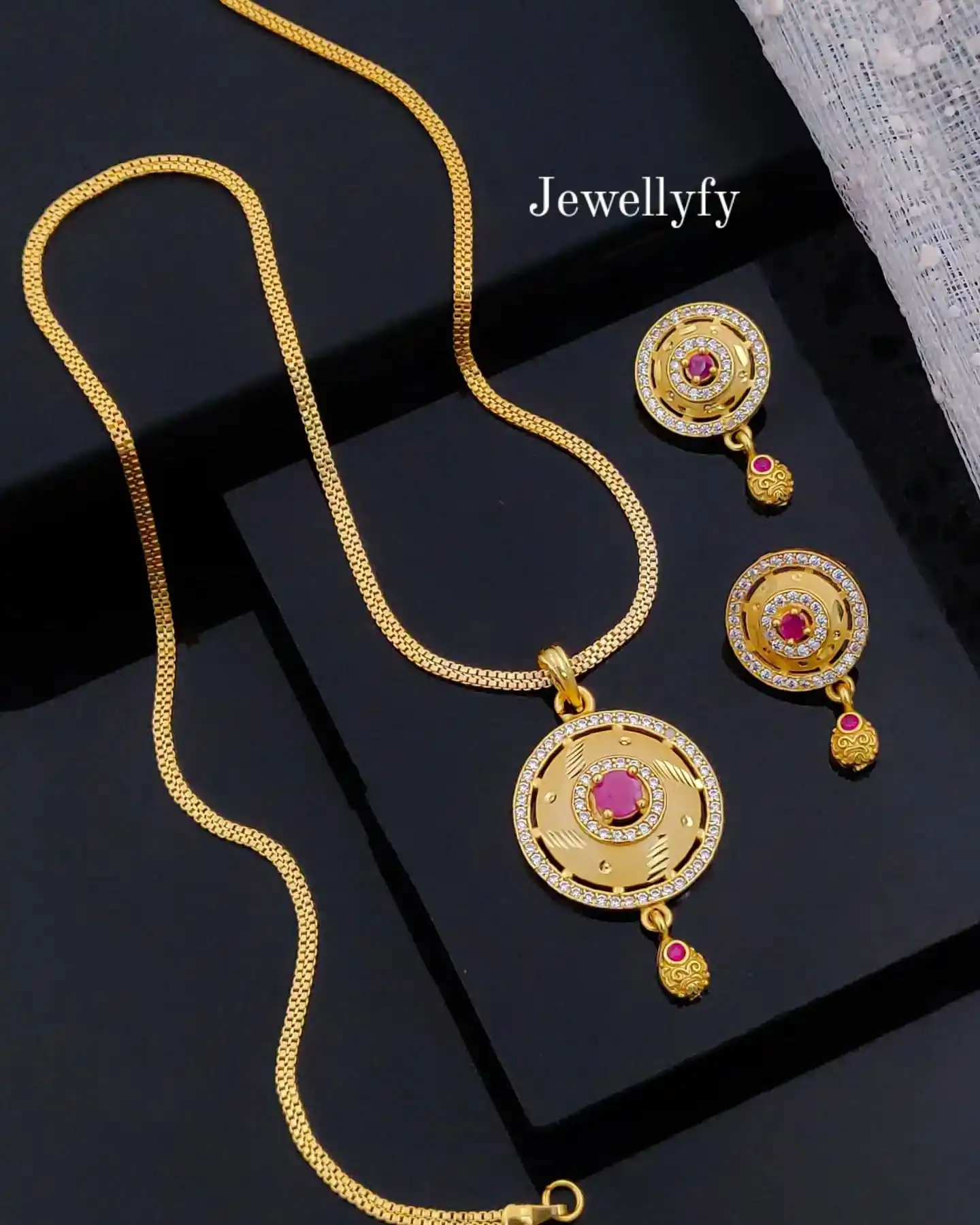 Gold-Plated Ruby-Studded Round Designer Pendant Set for Women.png