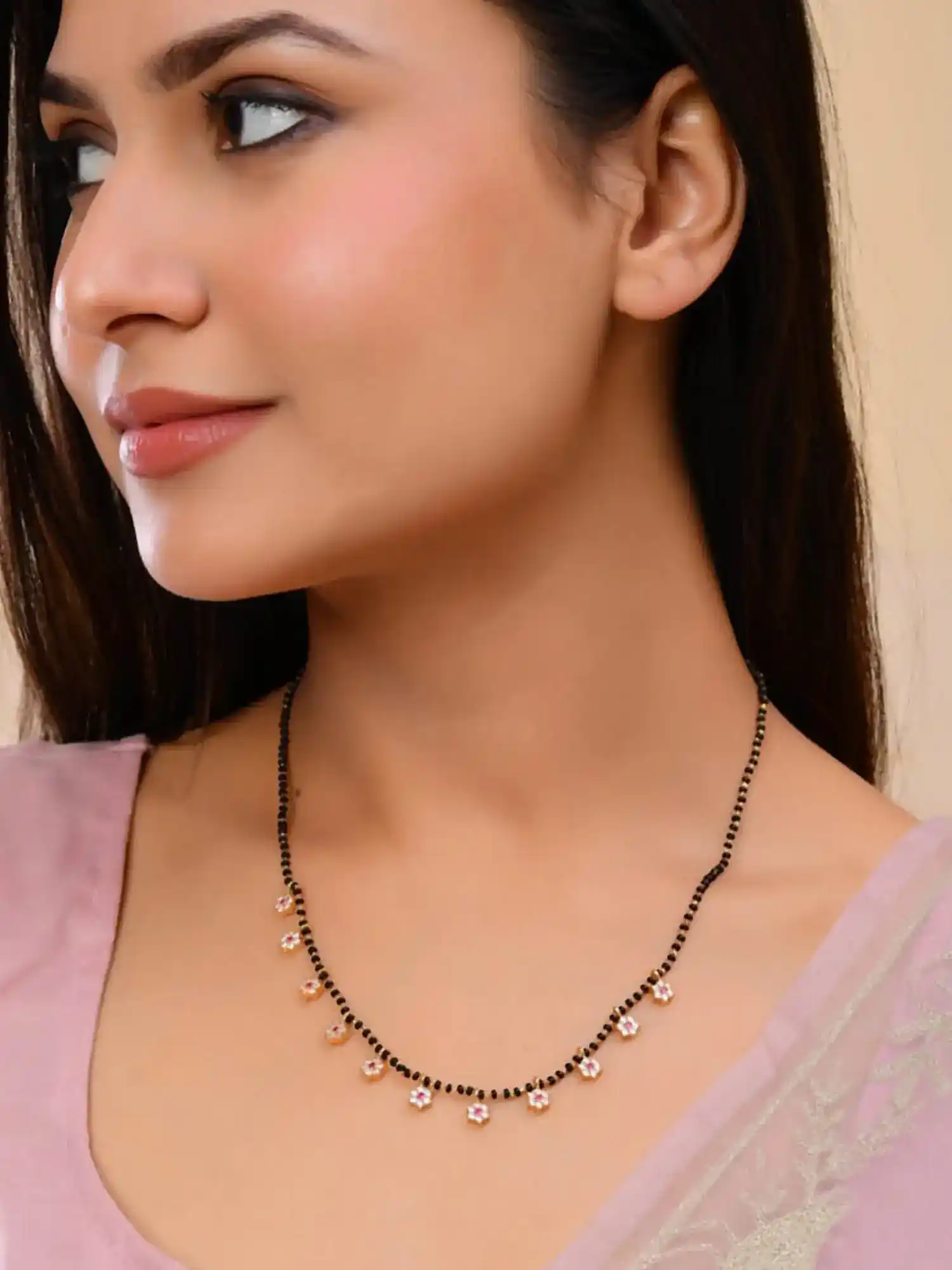 micro gold plated ad diamond studed fancy flower mangalsutra.png