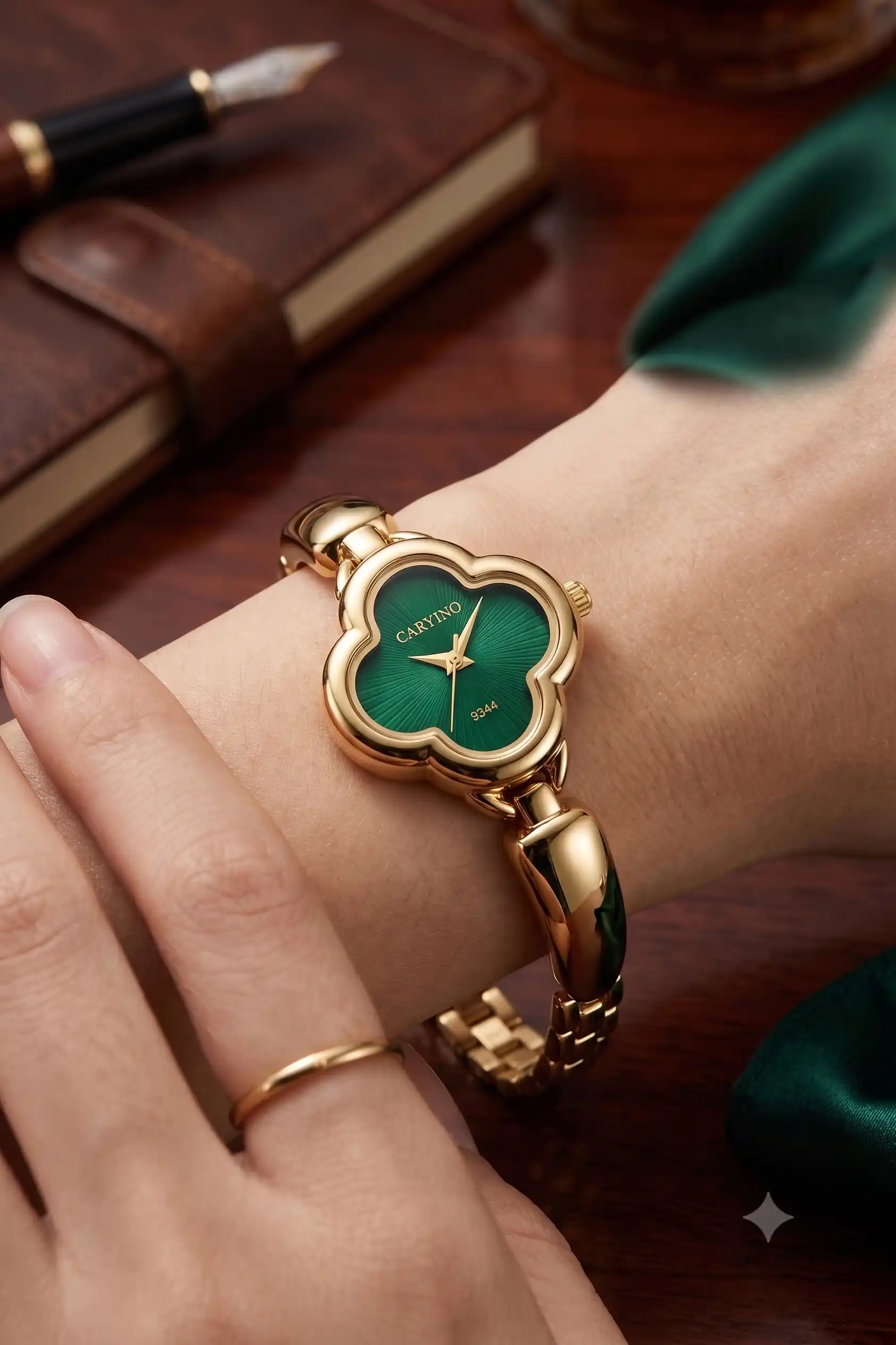 Elegant Green Dial Gold-Tone Clover Shape Analog Watch for Women.png