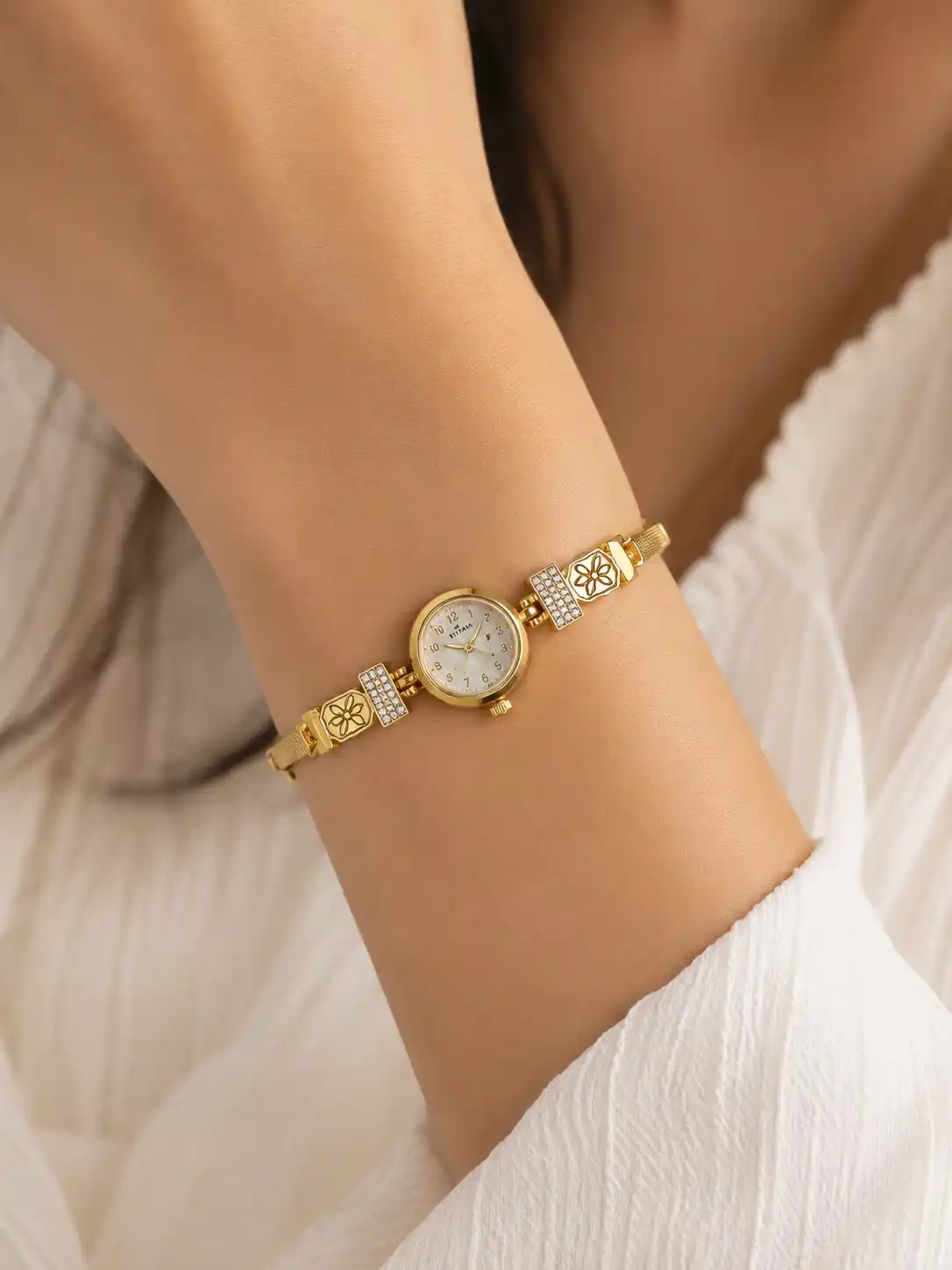 Elegant Gold-Tone Floral Crystal Bracelet Watch for Women | Premium Designer Analog Wrist Watch.png