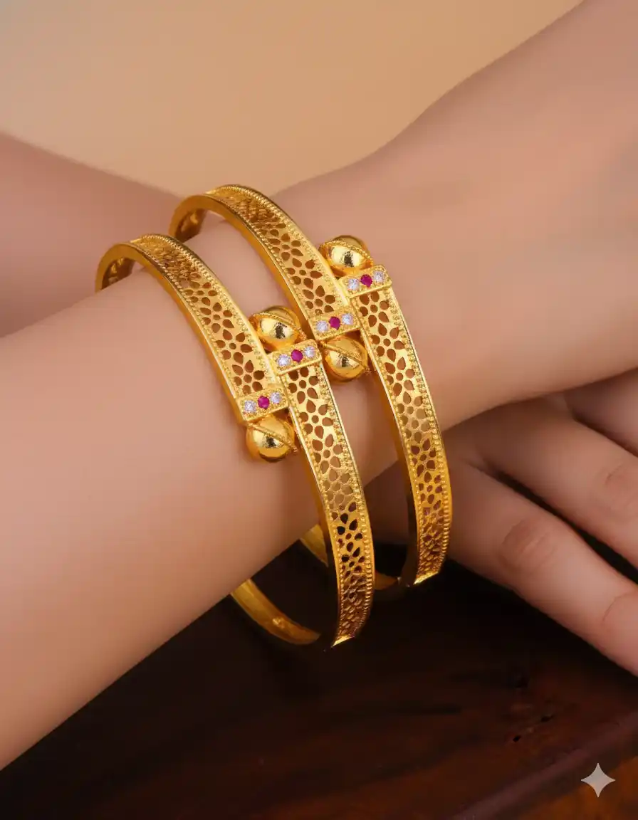 Golden Aura Cutwork Bangles – Elegant Texture with Stone Highlights.png