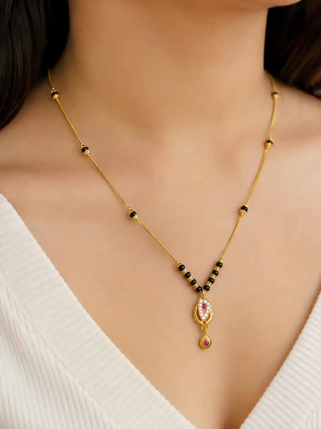 Elegant Gold-Plated Mangalsutra with CZ Stones & Ruby Drop Pendant | Traditional Daily Wear Necklace for Women.png