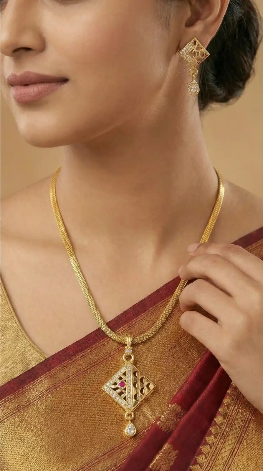 Micro Gold Plated AD Diamond Studded Fancy Oval Pendant Set with Chain.png