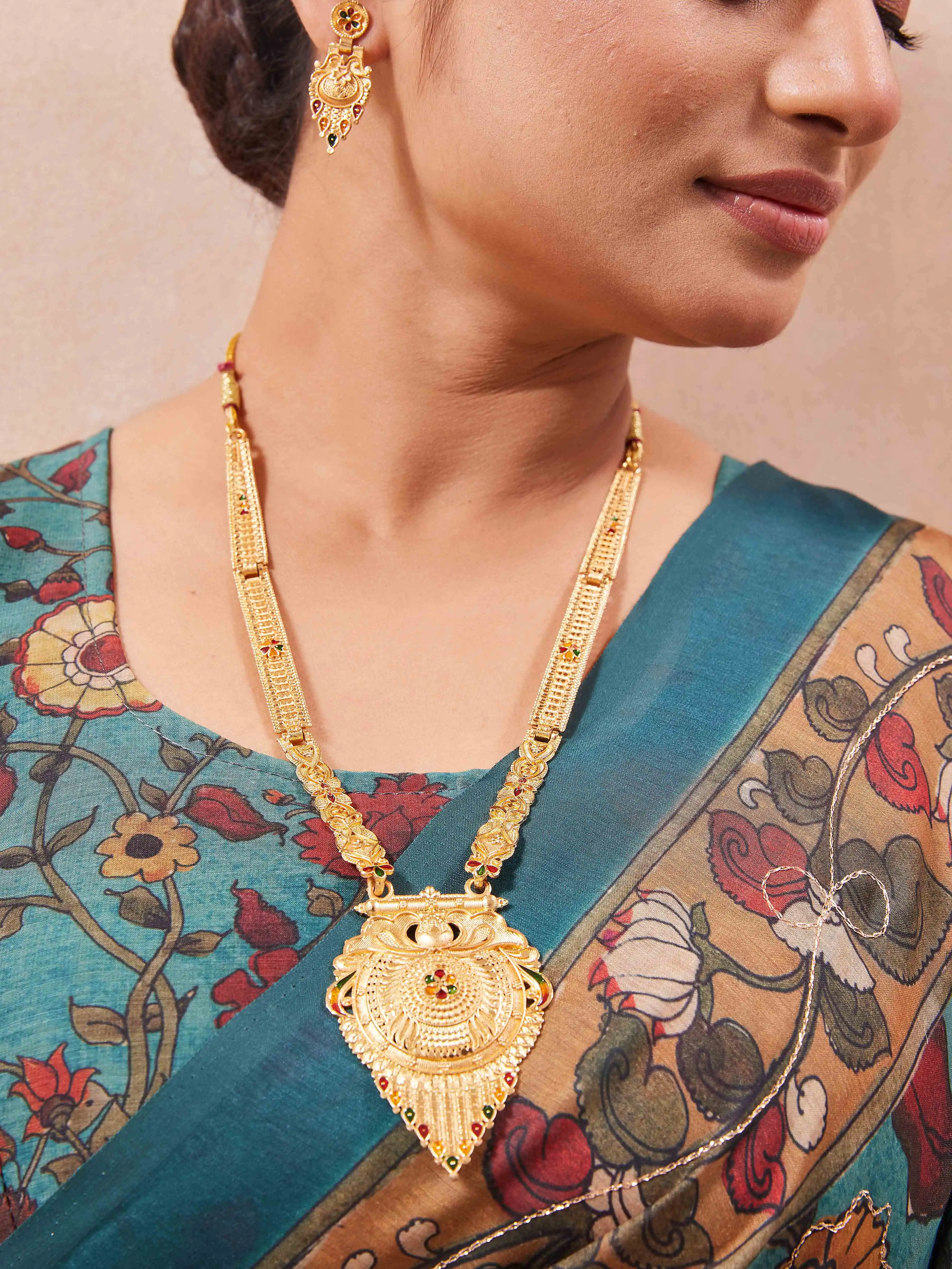 Teardrop mangalsutra with Earrings.png