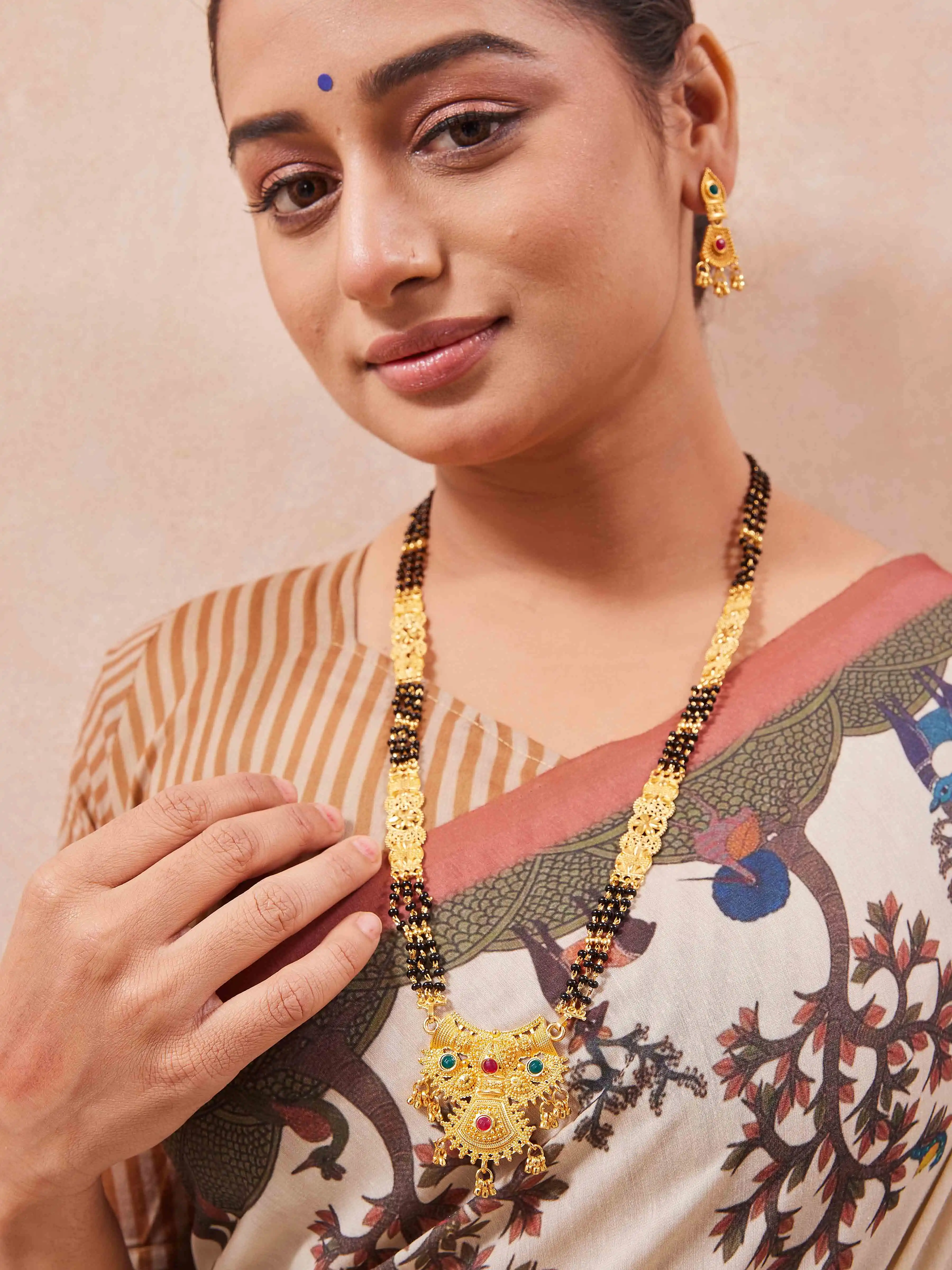 Teardrop mangalsutra with Earrings.png