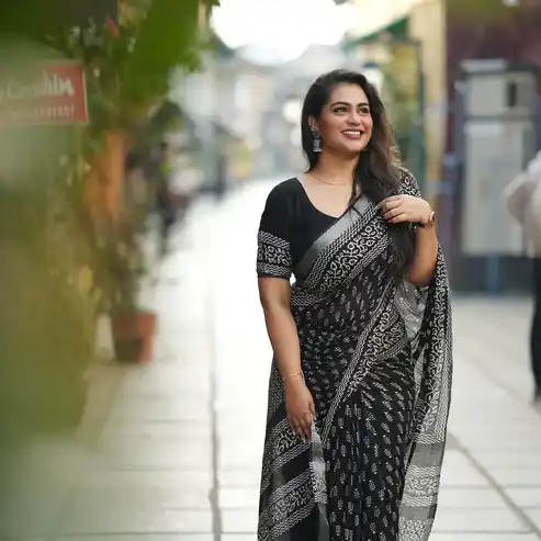 Elegant Black Linen Saree with Blouse – Perfect for Festive & Casual Wear.png