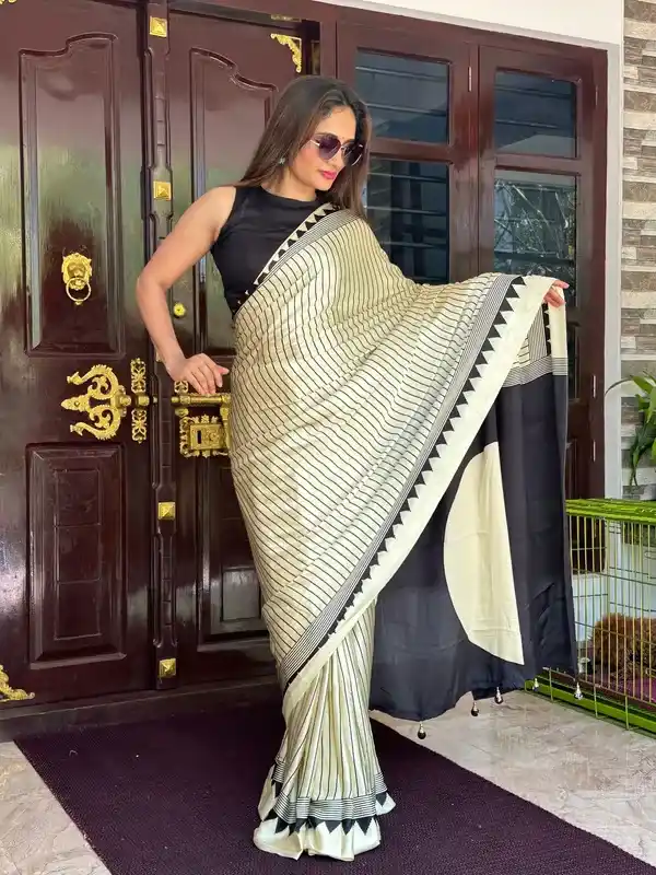 CREAM BINDI PALLU SEMI MODAL SILK SAREE.png
