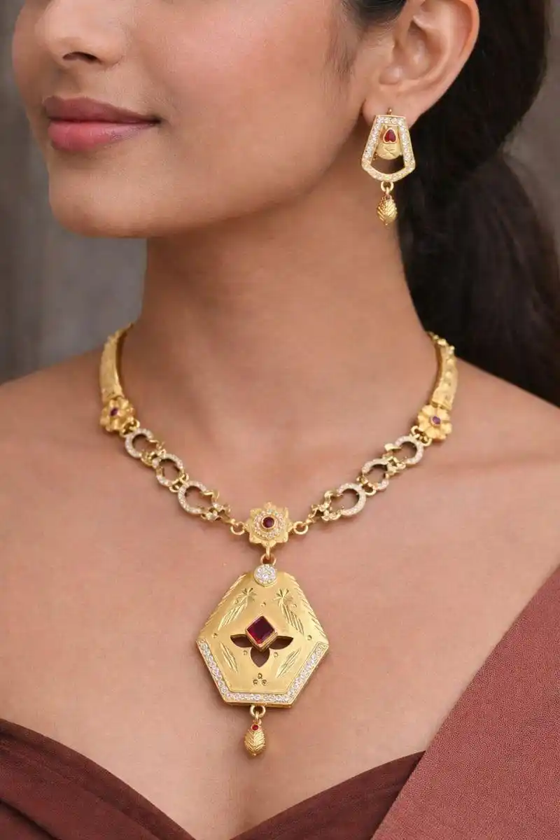 Gold-Toned Floral Necklace Set With Ruby Accents.png