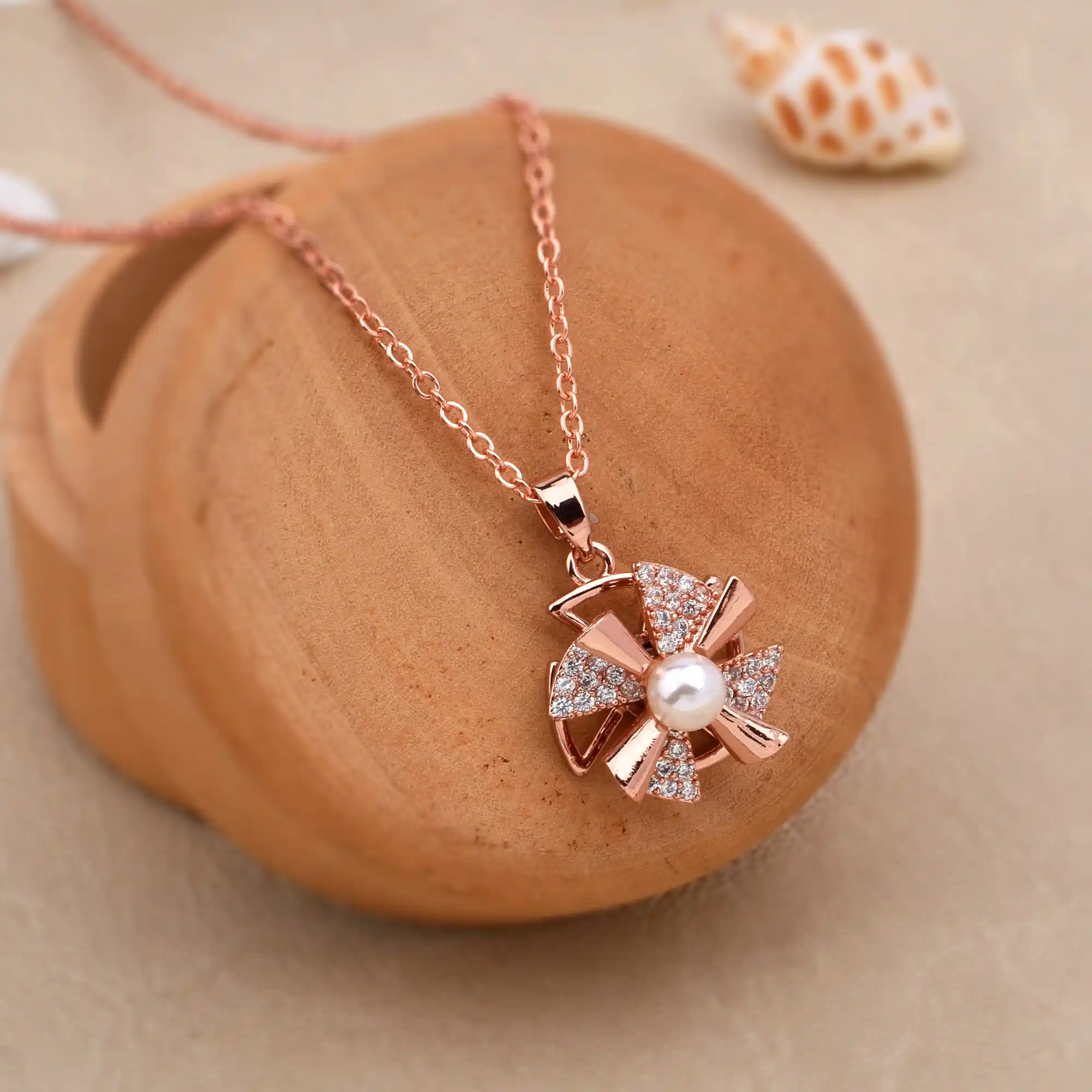 Rotating Rosy Glow Diamond Necklace.png