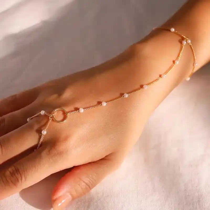 Haath Noor Gold Plated Pearl Bracelet Ring.png